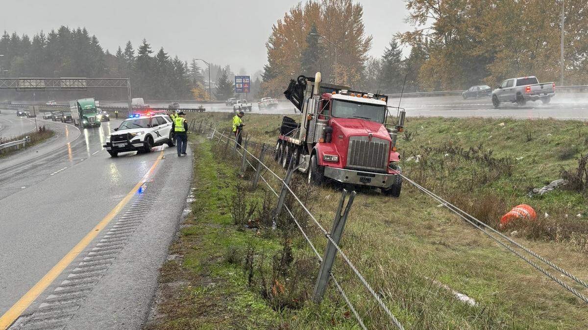 A semi-truck veered off the roadway in Puyallup and was entagled with a cable barrier on Nov. 14, 2025.