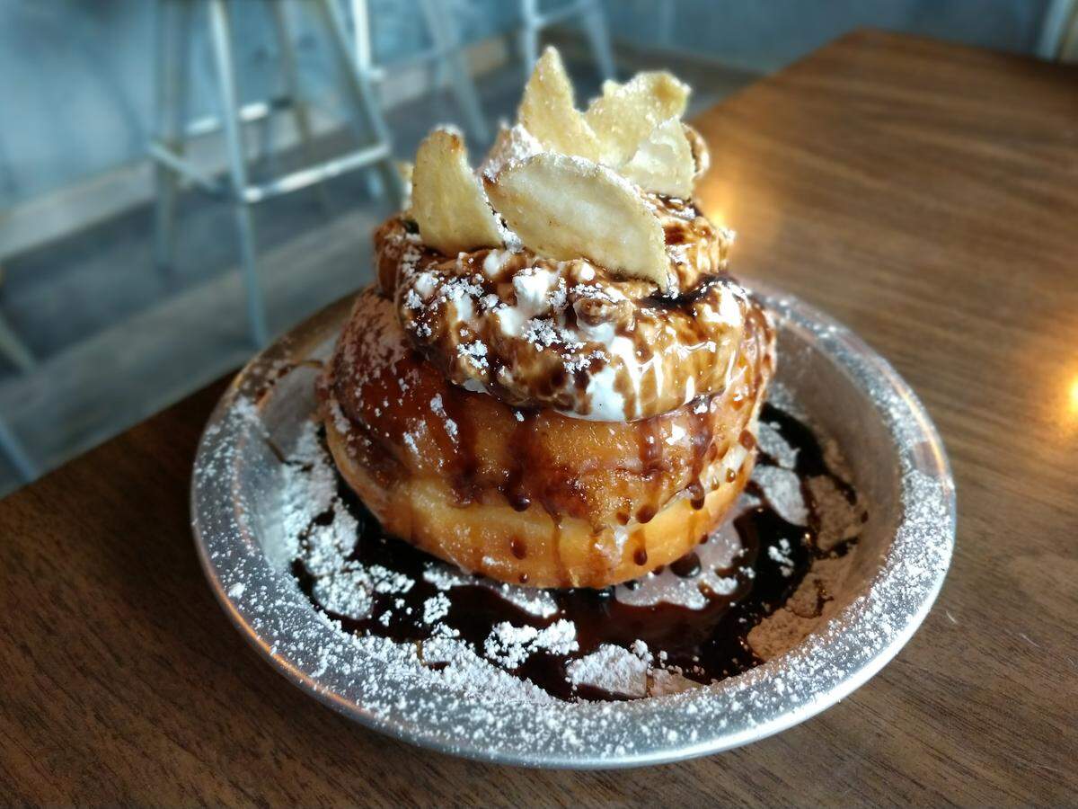 A big fluffy doughnut, called El Chapo, topped with potato chips. The desserts at Brimstone PNW are made with Pao’s doughnuts.