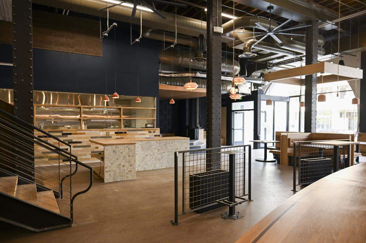 A view of the new restaurant, still awaiting all the furniture and final flourishes, from the back of the bar on Friday, April 10.