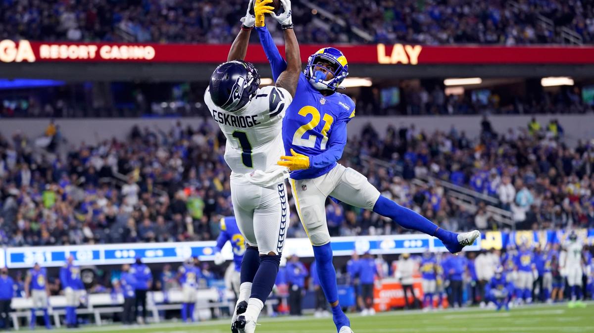 Los Angeles Rams cornerback Donte’ Deayon (21) breaks up a pass intended for Seattle Seahawks wide receiver Dee Eskridge in 2021. Deayon announced his retirement on Thursday.