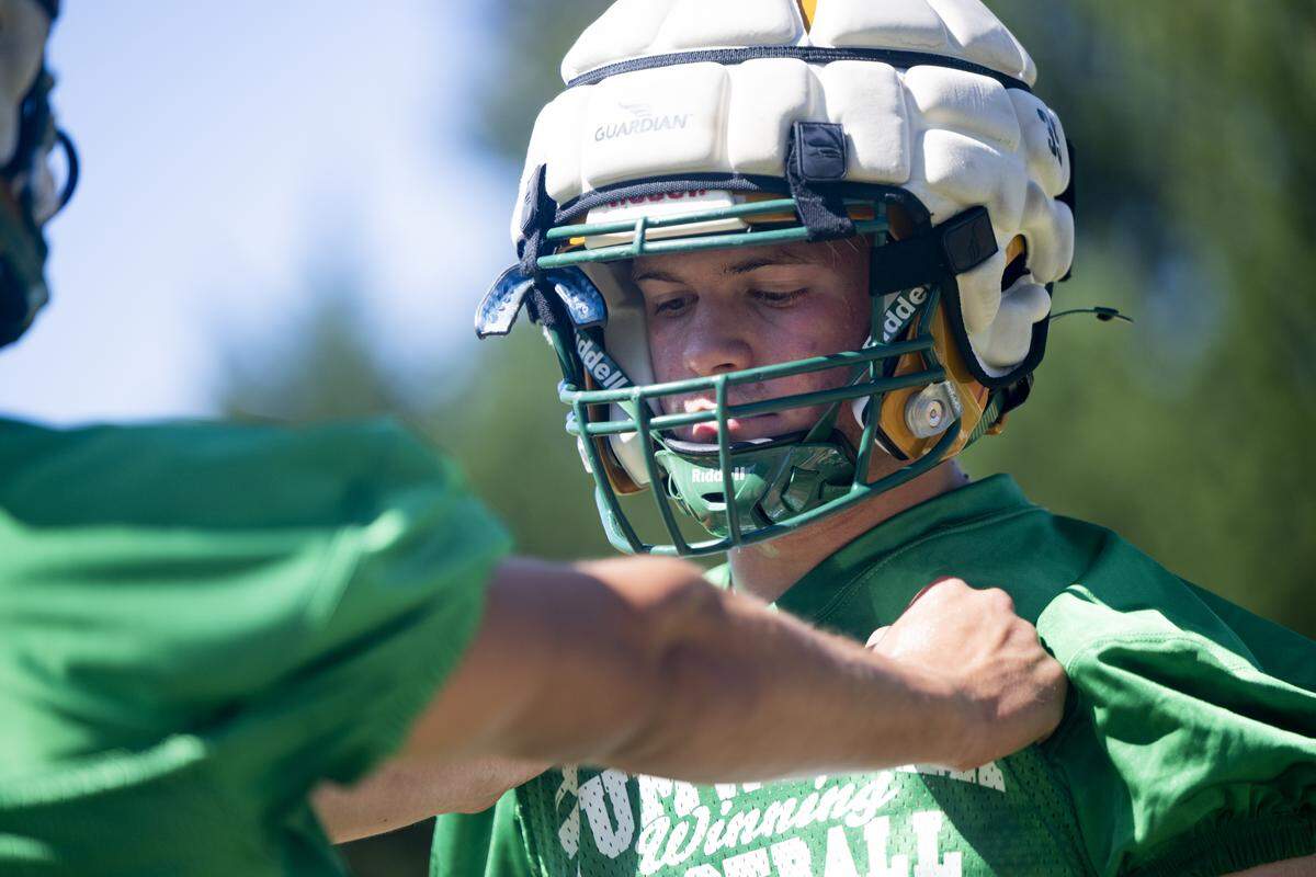 Tumwater linebacker Gavin Kaikkonen runs drills during a football practice at Tumwater High School on Friday, Aug. 22, 2025, in Tumwater, Wash.