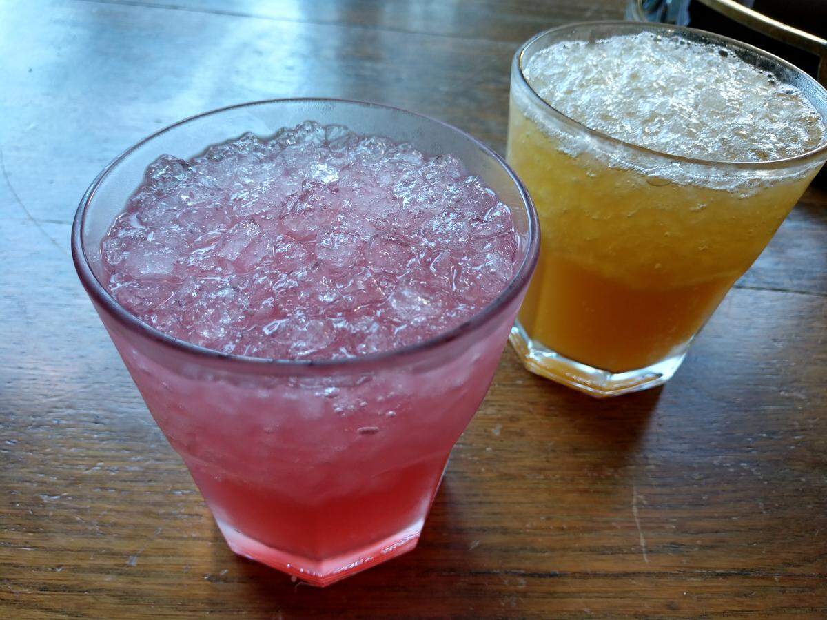 A tequila sunrise, left, and The Spaghetti Western, from The Fern Room in downtown Tacoma.