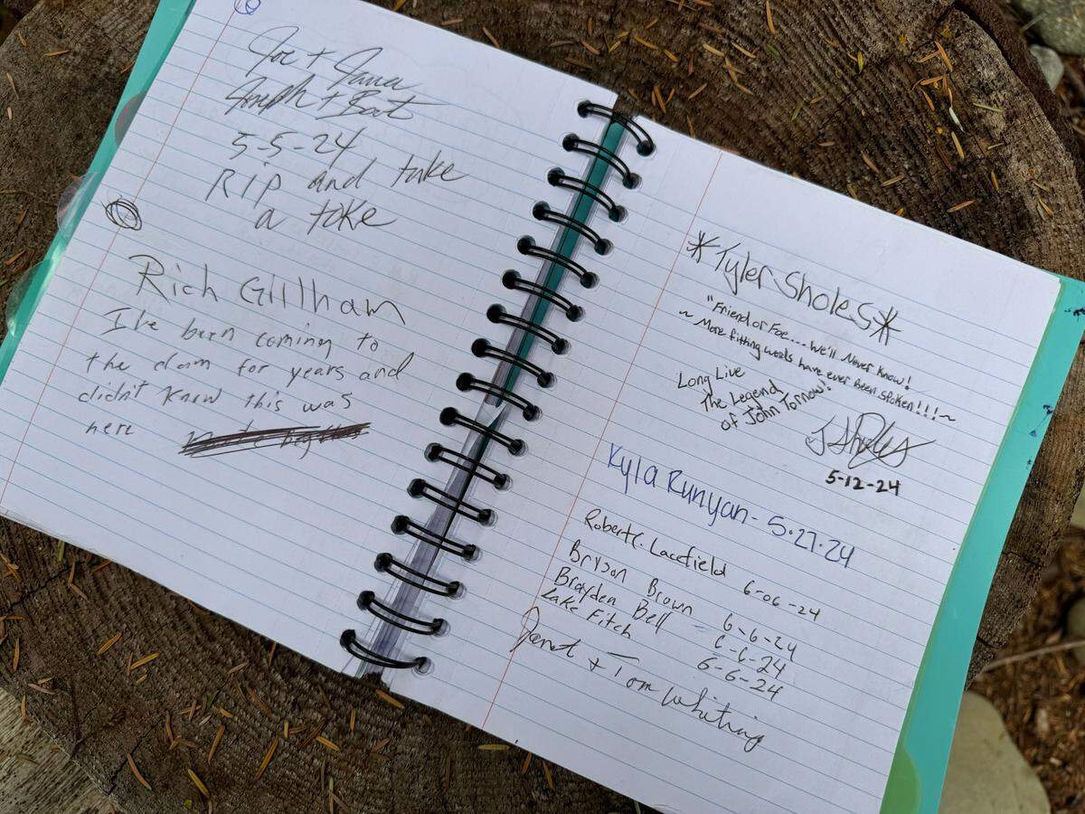 A log book is shown in September 2024 where it’s kept at the site in the Wynoochee Valley where outlaw John Tornow was shot and killed.