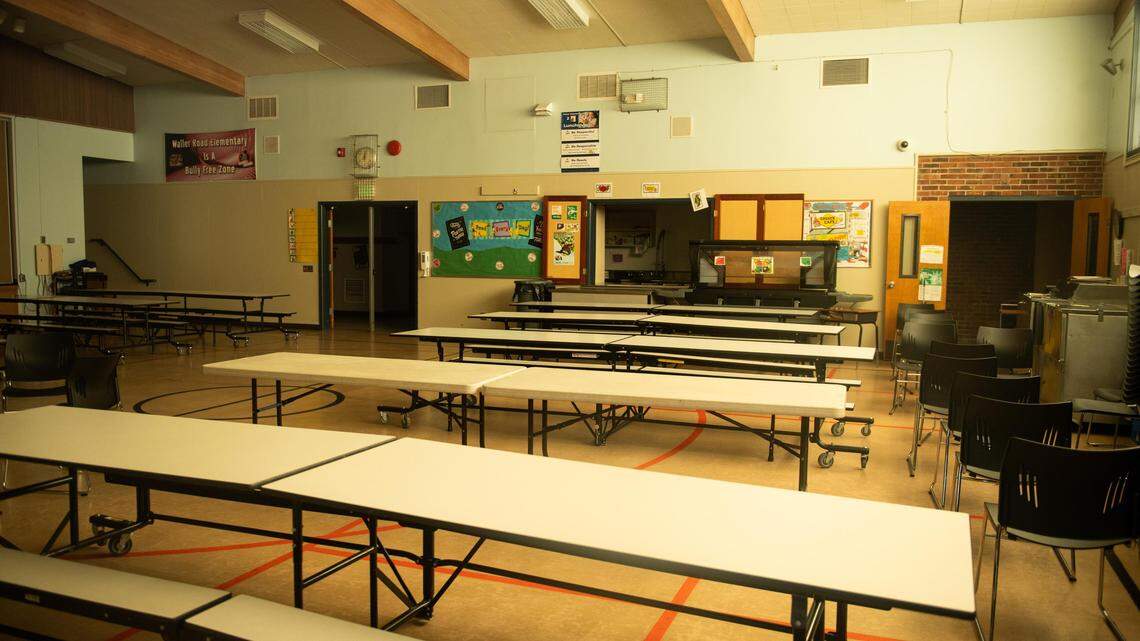 An empty cafeteria is seen at Waller Road Elementary in Waller, Wash., on Friday, March 20, 2020.