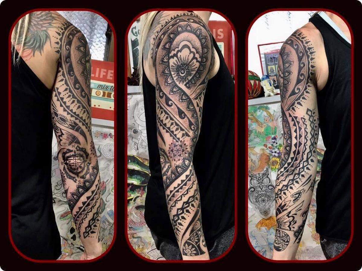 A tattoo sleeve from Inkspiration Studio artist Melissa Louie.
