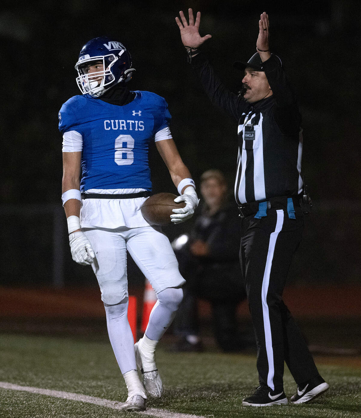 Curtis wide receiver Xavier Ahrens scores a two-point conversion during Friday night’s 4A state football opening round game against the Kennedy Catholic Lancers at Viking Stadium in University Place, Washington, on Nov. 10, 2023. Kennedy Catholic won the game, 37-34.