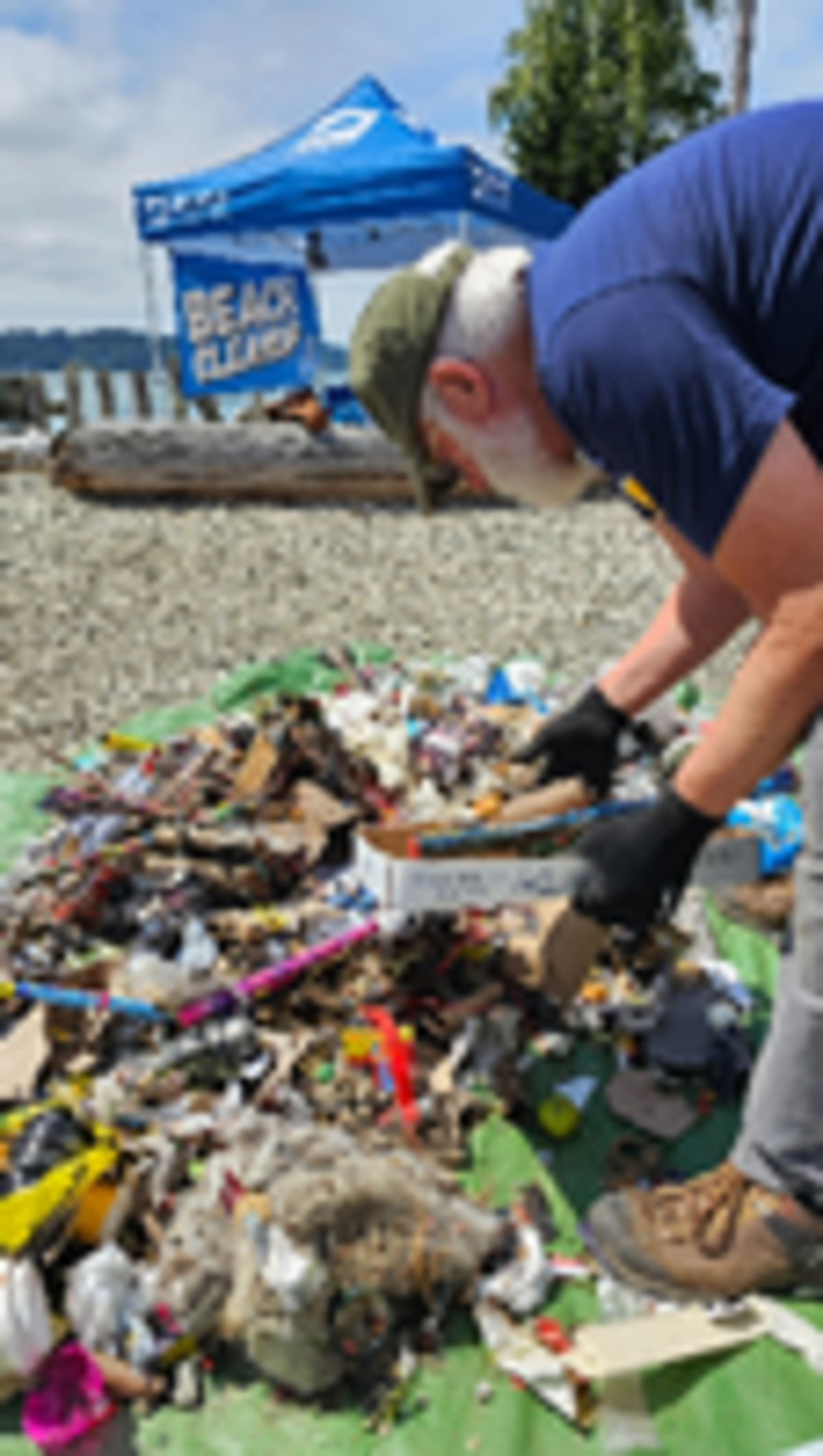 Volunteers picked up trash during the Purdy Sand Spit beach cleanup on July 5.