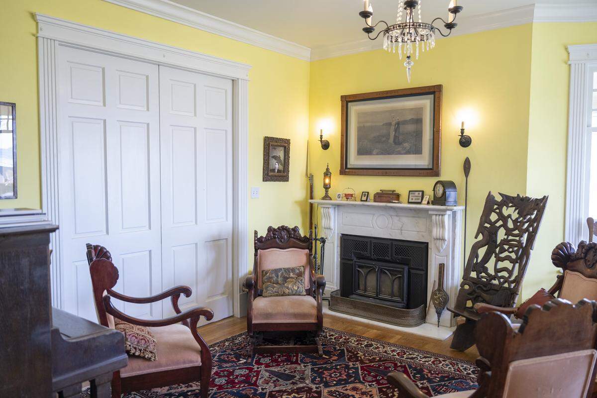 A parlor sits to the right of the entrance to a house featured in Tacoma's historic homes tour on Thursday, April 30, 2026, in the North End of Tacoma, Wash.