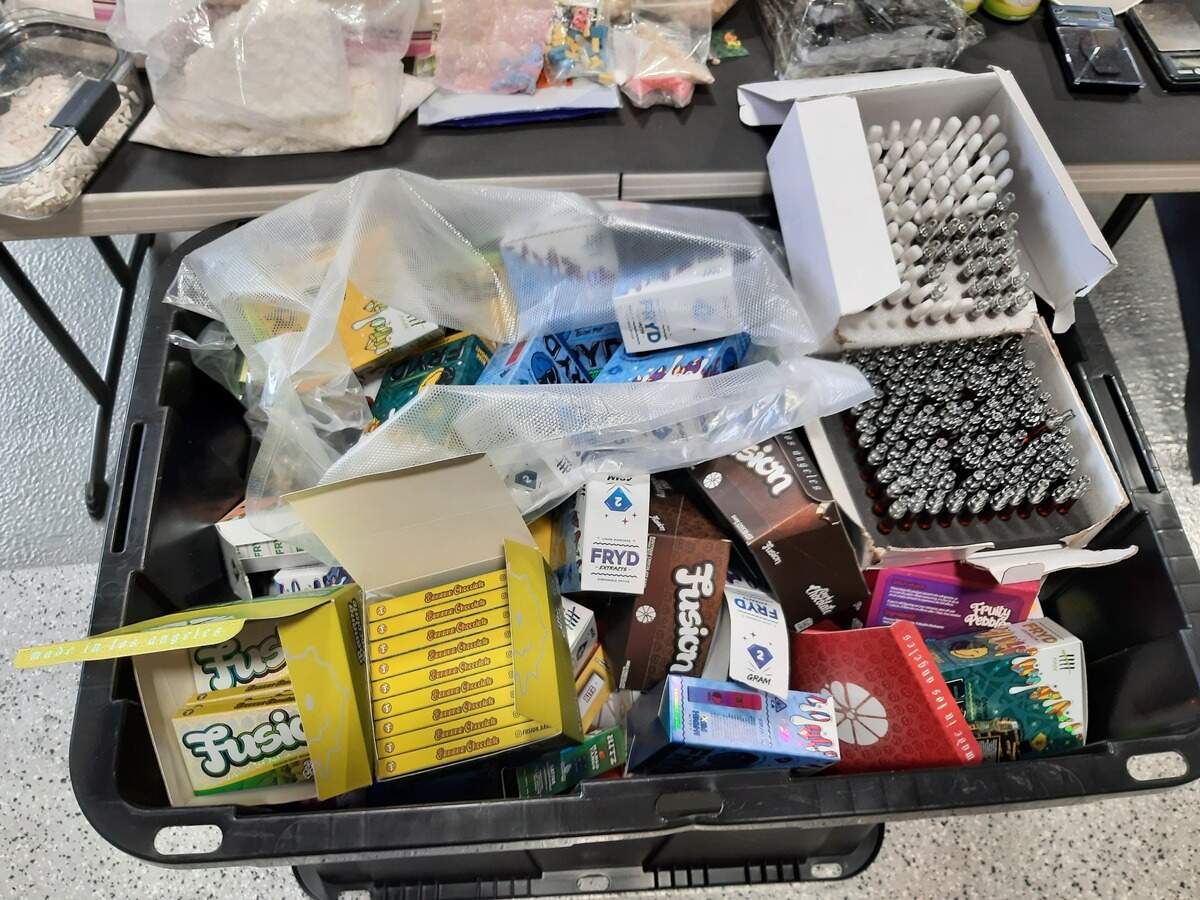 Some of the drugs and paraphernalia seized during a search of a home on South 11th Street in Tacoma Monday morning after police were drawn to the location by reports of gunfire.