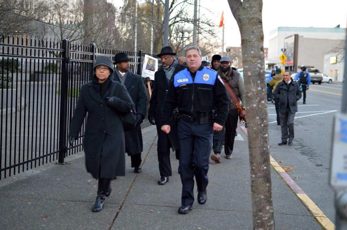 Tacoma Police Chief Don Ramsdell and then-Mayor Marilyn Strickland march side-by-side.