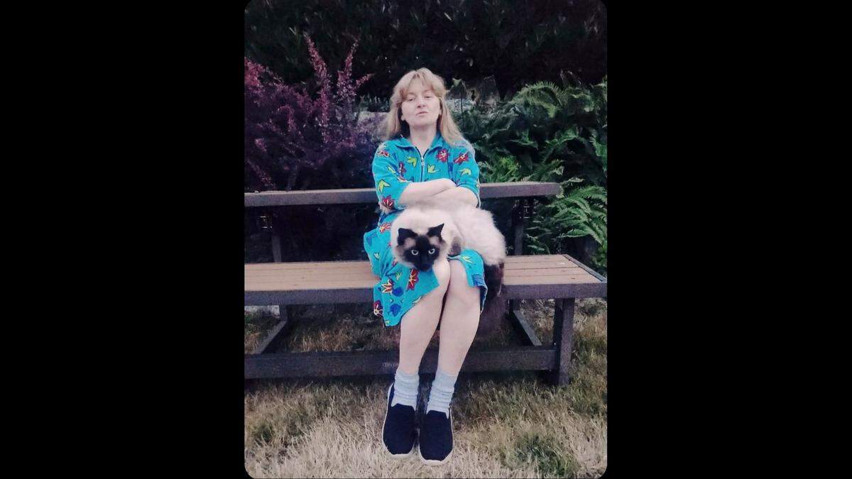Zoya Shablykina is pictured in an undated photograph with her cat, Pushok. Shablykina, 52, died Tuesday, Feb. 24, 2026 during a stabbing attack at her home in the Purdy area of Pierce County.