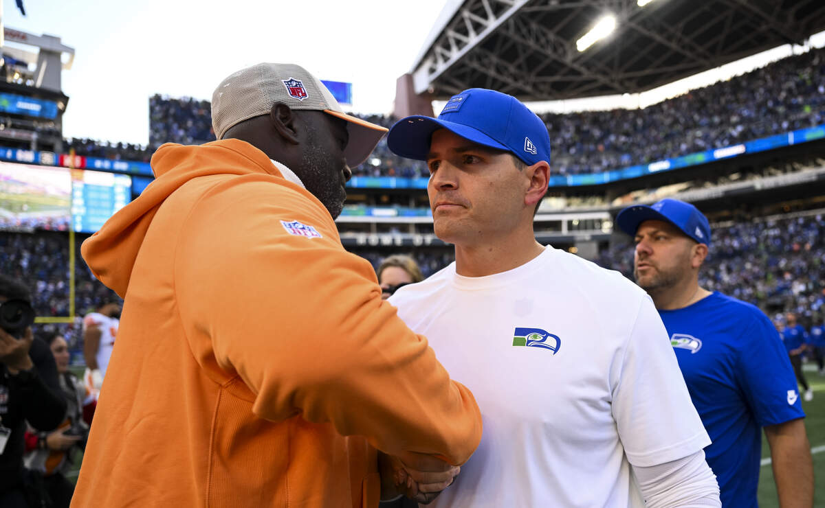 Tampa Bay Buccaneers head coach Todd Bowles and Seattle Seahawks head coach Mike MacDonald shake hands after the Seattle Seahawks 38-35 loss at Lumen Field, on Sunday, Oct. 5, 2025, in Seattle.