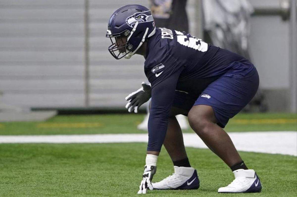 First-round draft choice Charles Cross in rookie minicamp at the Seahawks’ training facility in Renton on May 6, 2022.