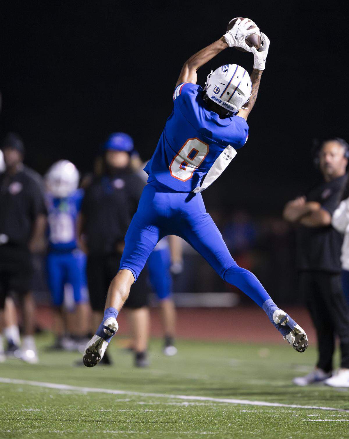 Graham-Kapowsin Eagles wide receiver Maazia Roberson (8) catches a pass and picks up yards to the 1-yard line during the second half of the game against the O’Dea Fighting Irish at Art Crate Field, on Friday, Sept. 5, 2025, in Spanaway, Wash.