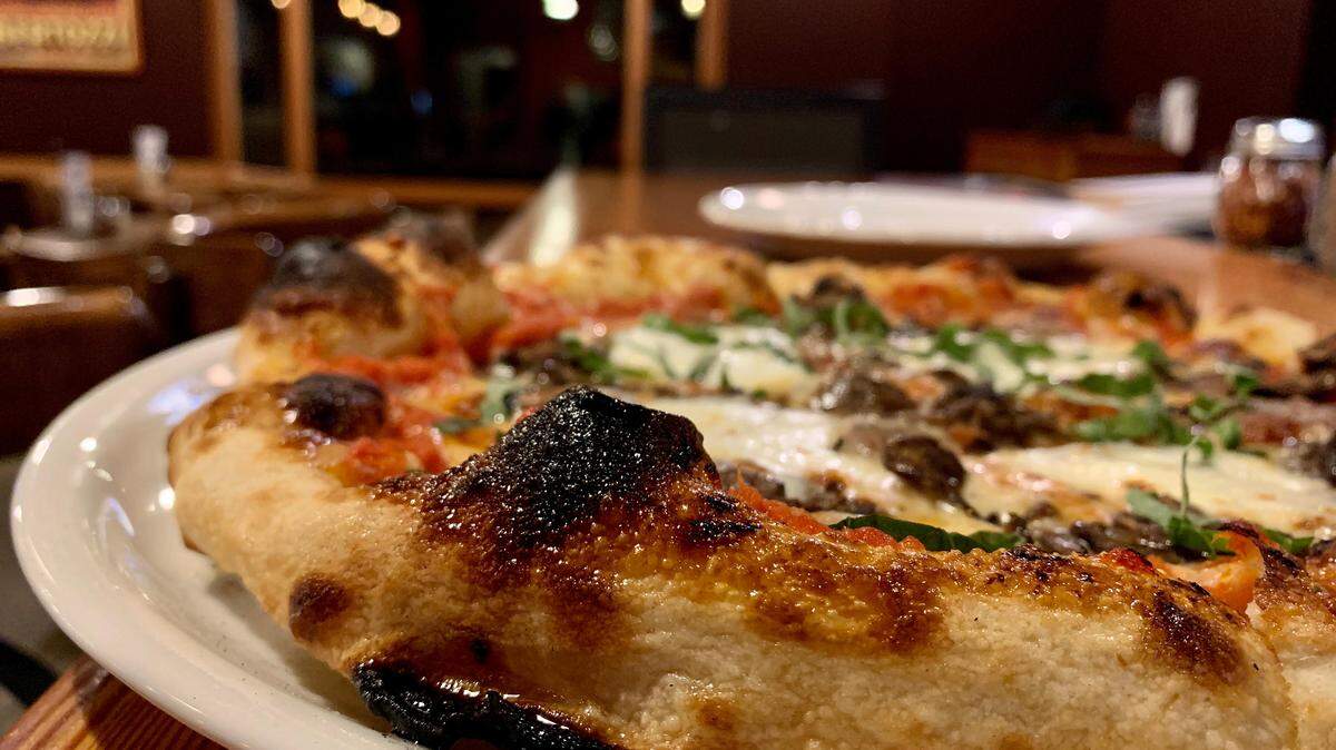The Sausage & Mushroom pie at Fondi Pizzeria in Gig Harbor shows off its excellent crust.