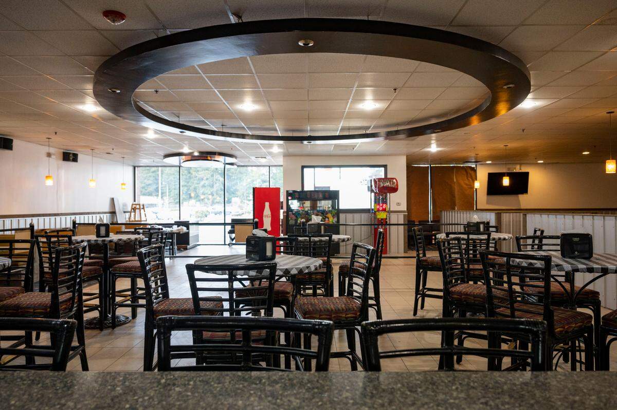Tables, chairs and booths are set up in preparation for the opening in May of Chi Town Pizza, a restaurant located at 15619 Pacific Ave. South, that will serve Chicago-style food like pan pizza, hot dogs and Italian beef sandwiches.