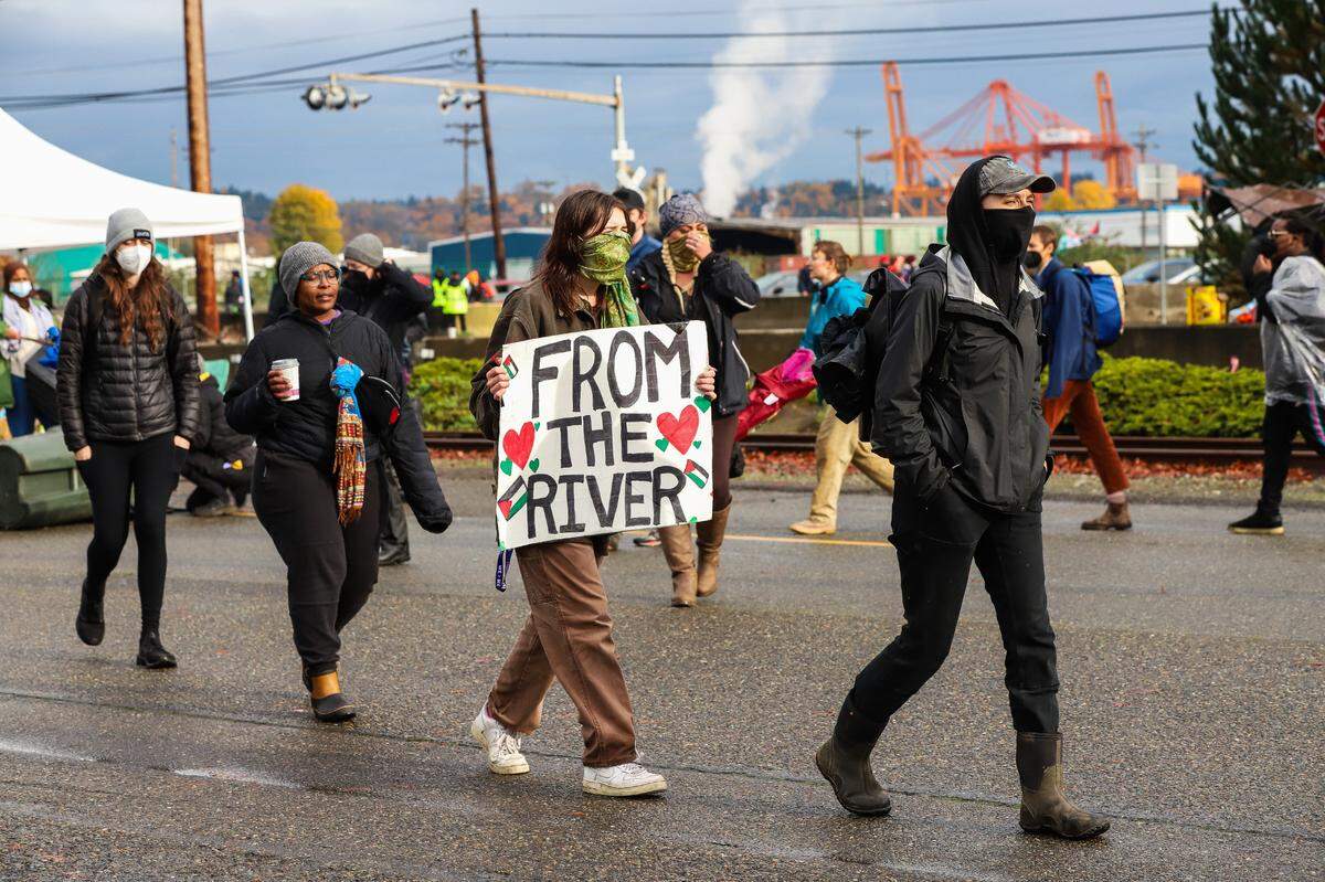Protesters blocked the entrance to a pier during the “block the boat” protest at the Port of Tacoma on Nov. 6, 2023. Protesters believed the MV Cape Orlando was docked at the Port of Tacoma to pick up weapons for delivery to Israel.