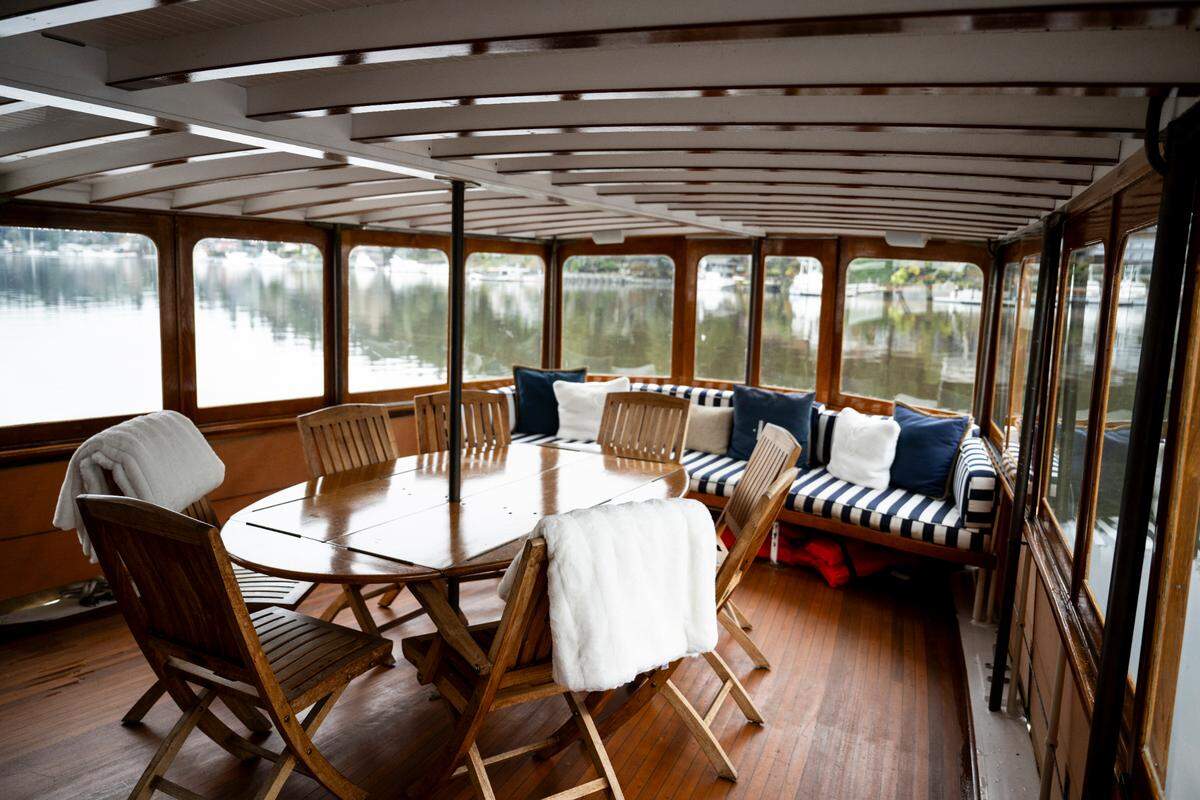 The Linmar “boat-tel” has a dining area with a view. The boat sleeps 12.