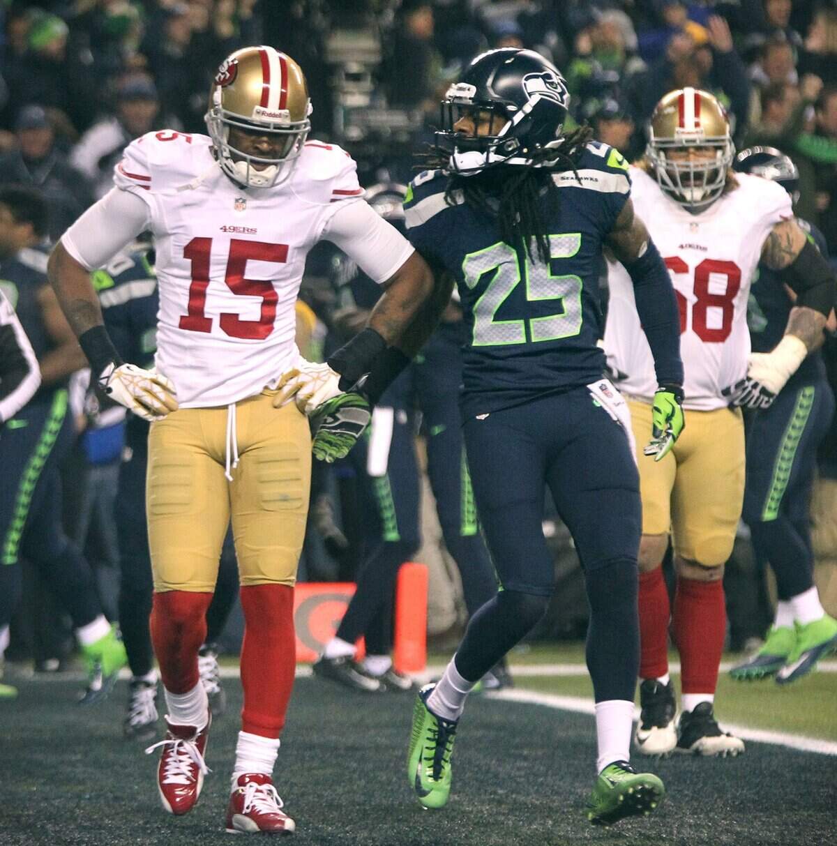 Seattle Seahawks cornerback Richard Sherman rubs in the defeat after knocking away a pass from San Francisco wide receiver Michael Crabtree (15) in the NFC championship game at CenturyLink Field in Seattle on Sunday, Jan. 19, 2014. The Seattle Seahawks defeated the San Francisco 49ers, 23-17. (Tony Overman/The Olympian/MCT)