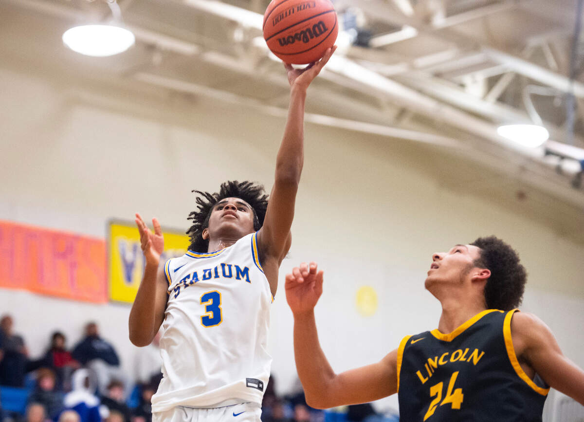 Stadium’s guard Donovan Gill (3) goes in for a layup during a game against Lincoln at Stadium High School in Tacoma, Wash. on Jan. 18, 2023. Stadium defeated Lincoln 65-54.