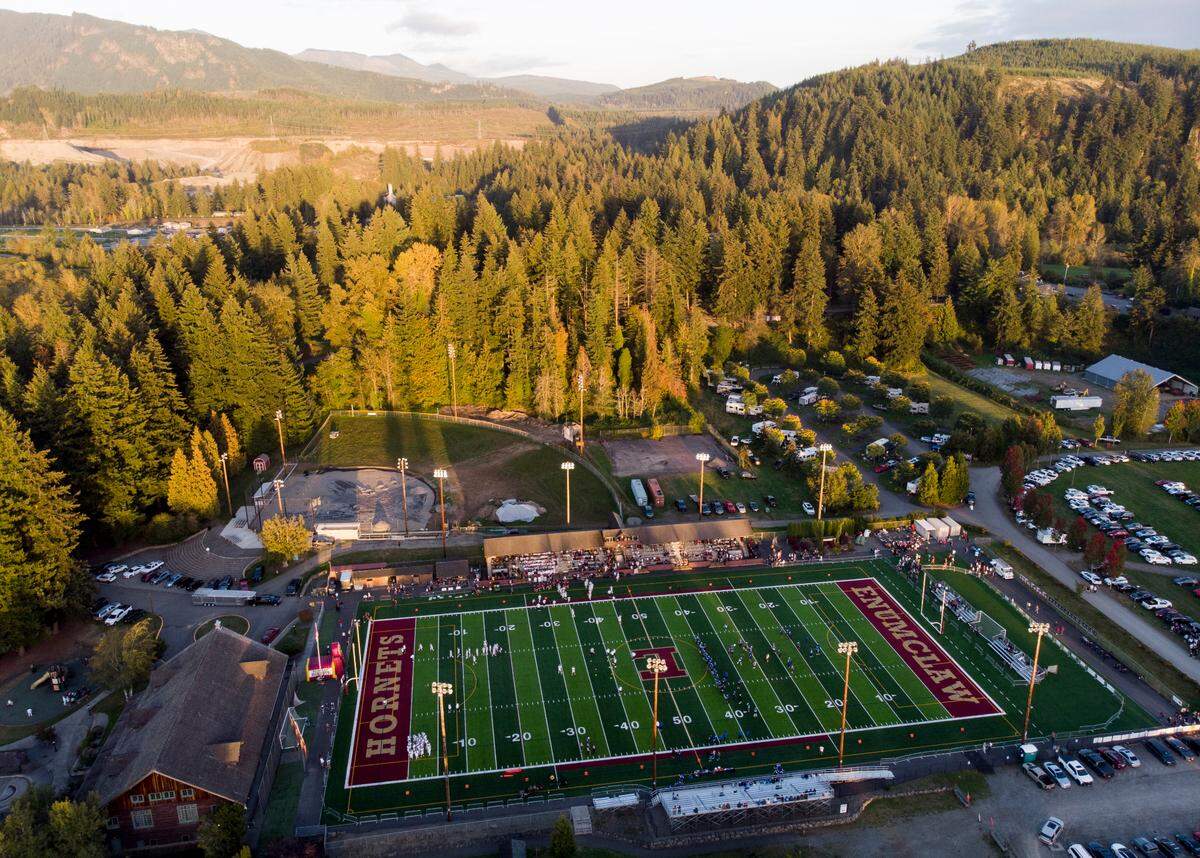 Enumclaw and Federal Way warm up before the first half of the game at Pete’s Pool Ballfield, on Friday, Sept. 27, 2024, in Enumclaw, Wash.
