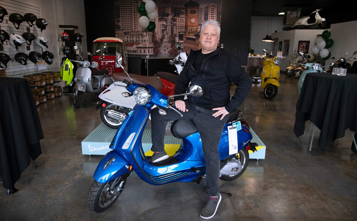 Owner Mark Helgen is preparing for the Grand Opening celebration this weekend at his new South Sound Scooters dealership in downtown Tacoma, Washington, on Thursday, April 21, 2022.