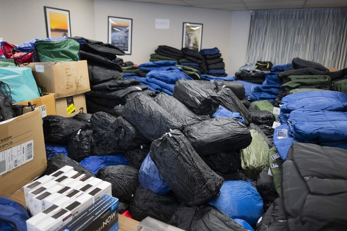 A room full of supplies including blankets, sleeping bags, hand warmers, Naxolone, food and other things are packaged at the Pierce County Human Services to be handed out during the Point in Time Count, on Thursday, Jan. 29, 2026, in Tacoma, Wash.