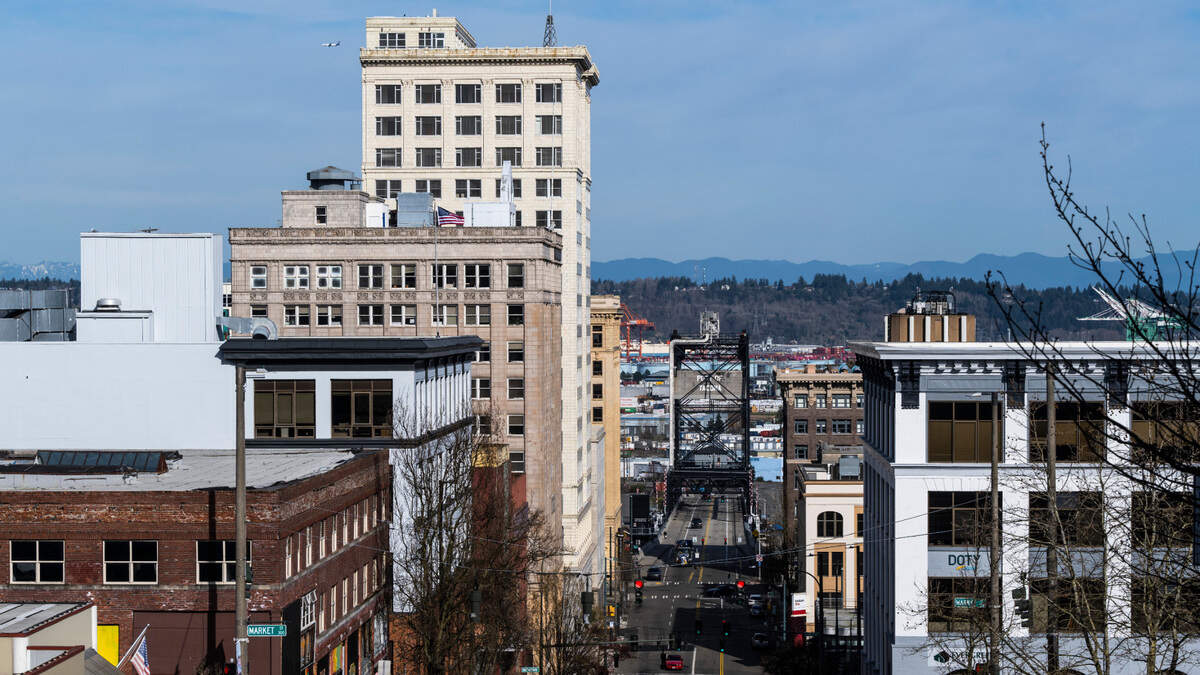 A view of downtown Tacoma and The Astor apartments in the background on the left on Thursday, March 24, 2022. Rate of rent growth appears to be slowing down, and one new report shows where to get the most value for the money.