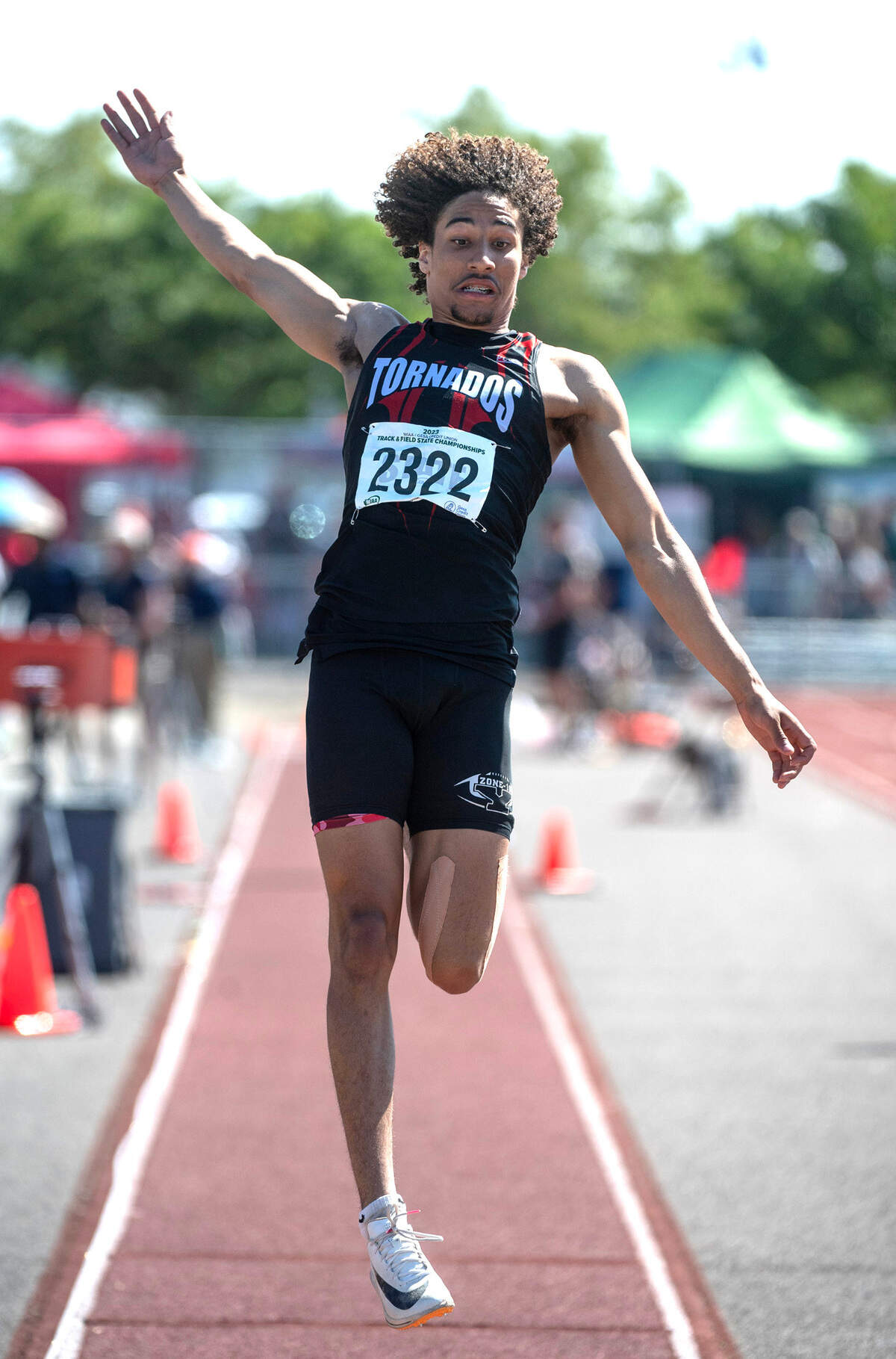 Yelm’s Trevontay Smith leaps to a second-place finish in the 3A boys long jump competition during the second day of the WIAA state track and field championships at Mount Tahoma High School in Tacoma, Washington, on Friday, May 26, 2023.