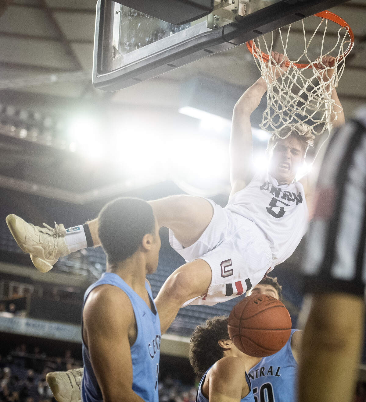 Union’s Tanner Toolson dunks during the fourth quarter. Central Valley played Union in a basketball game at Hardwood Classic at the Tacoma Dome in Tacoma, Wash., on Friday, March 6, 2020.