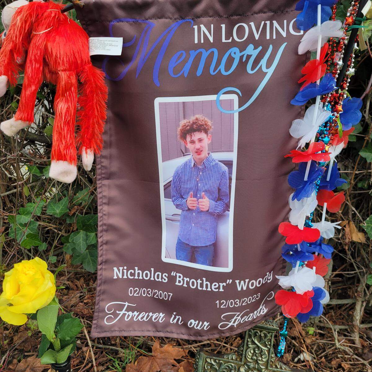 Nicholas Woody II is pictured in a memorial set up at his gravesite in Lakewood.