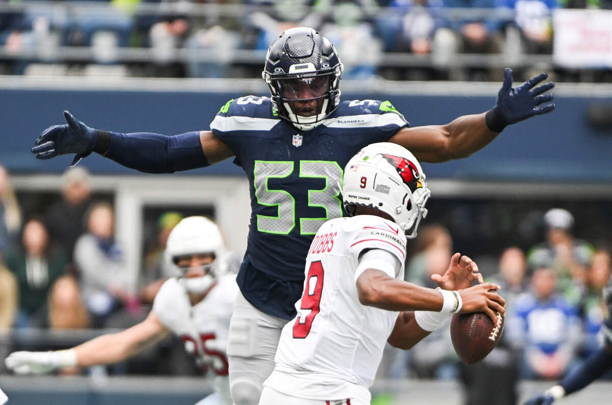 Seattle Seahawks linebacker Boye Mafe (53) pressures Arizona Cardinals quarterback Joshua Dobbs (9) during the second quarter of the game at Lumen Field, Sunday, Oct. 22, 2023, in Seattle, Wash.