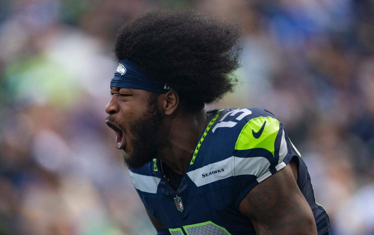 Seattle Seahawks linebacker Ernest Jones IV (13) runs out onto the field before the game against the Los Angeles Rams at Lumen Field, on Sunday, Nov. 3, 2024 in Seattle, Wash.