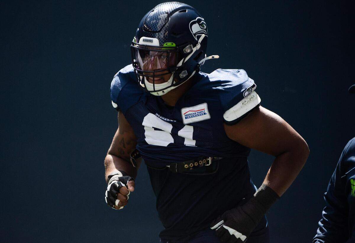 Kyle Fuller takes the field for warmups. The Seattle Seahawks held a practice game at CenturyLink Field in Seattle, Wash., on Saturday, Aug. 22, 2020.