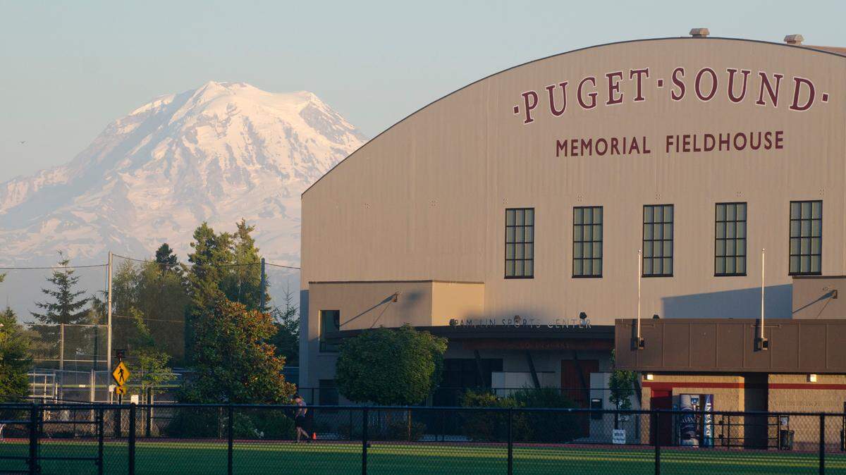 Memorial Fieldhouse with Mount Rainier in the background.