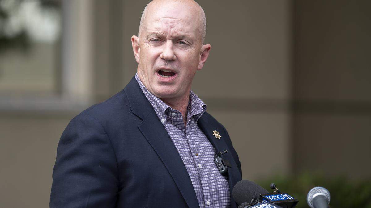 Pierce County Sheriff Keith Swank answers media questions at a press conference in this October file photo.