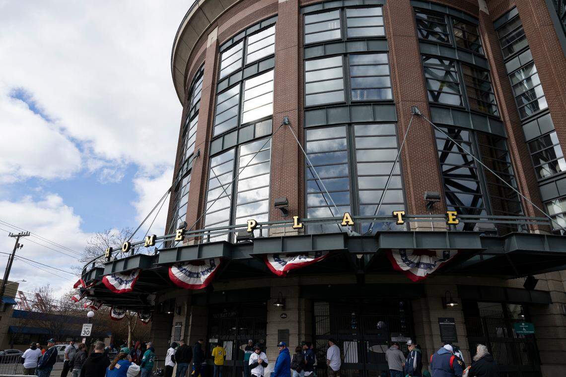 Fans line up at the gates before the opening day game between the Boston Red Sox and Seattle Mariners at T-Mobile Park, on Thursday, March 28, 2024, in Seattle, Wash.