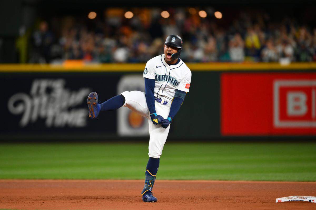 Oct 5, 2025; Seattle, Washington, USA; Seattle Mariners center fielder Julio Rodriguez (44) celebrates after hitting an RBI double against the Detroit Tigers in the eighth inning during game two of the ALDS round for the 2025 MLB playoffs at T-Mobile Park. Mandatory Credit: Steven Bisig-Imagn Images