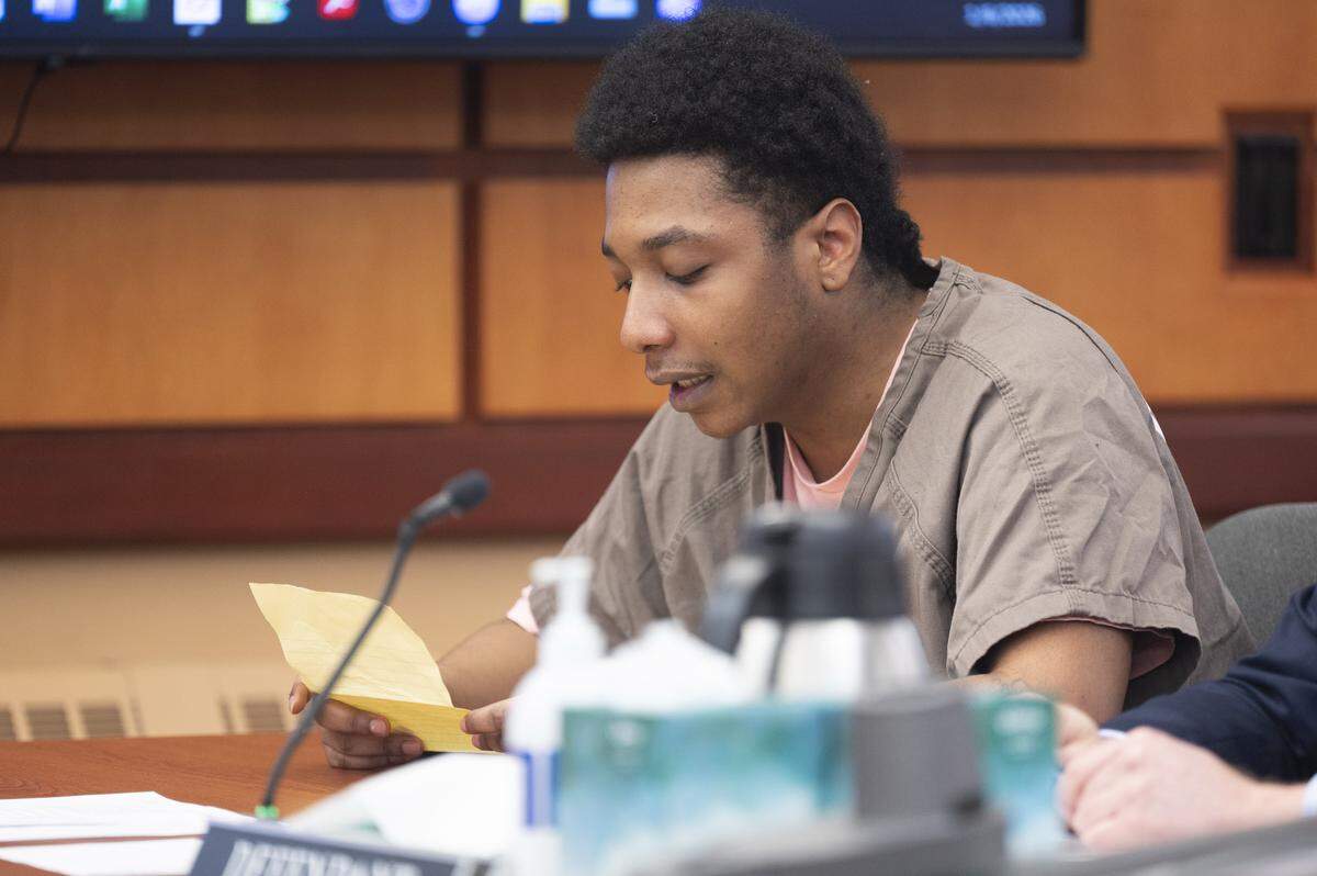 Michael Miller-Jimerson, 26, speaks at his sentencing hearing on Tuesday, Jan. 6, 2026, at Pierce County Superior Court in Tacoma, Wash. Miller-Jimerson plead guilty to second-degree murder for directing three teenagers in the March 19, 2022 robbery of the World of Weed dispensary in Tacoma, where an employee, 29-year-old Jordan Brown, was shot and killed.