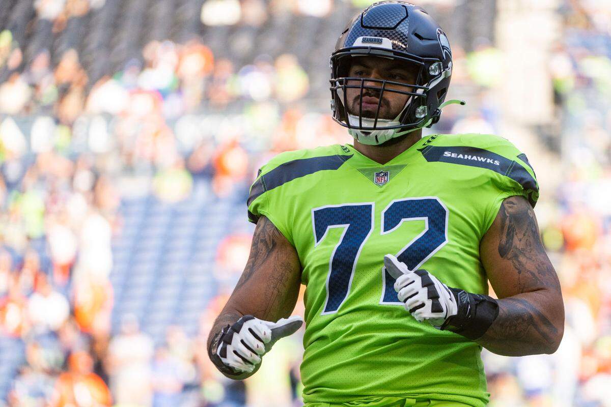 Seattle Seahawks offensive tackle Abraham Lucas (72) warms up prior to the start of an NFL game against the Denver Broncos on Monday, Sept. 12, 2022, at Lumen Field in Seattle.