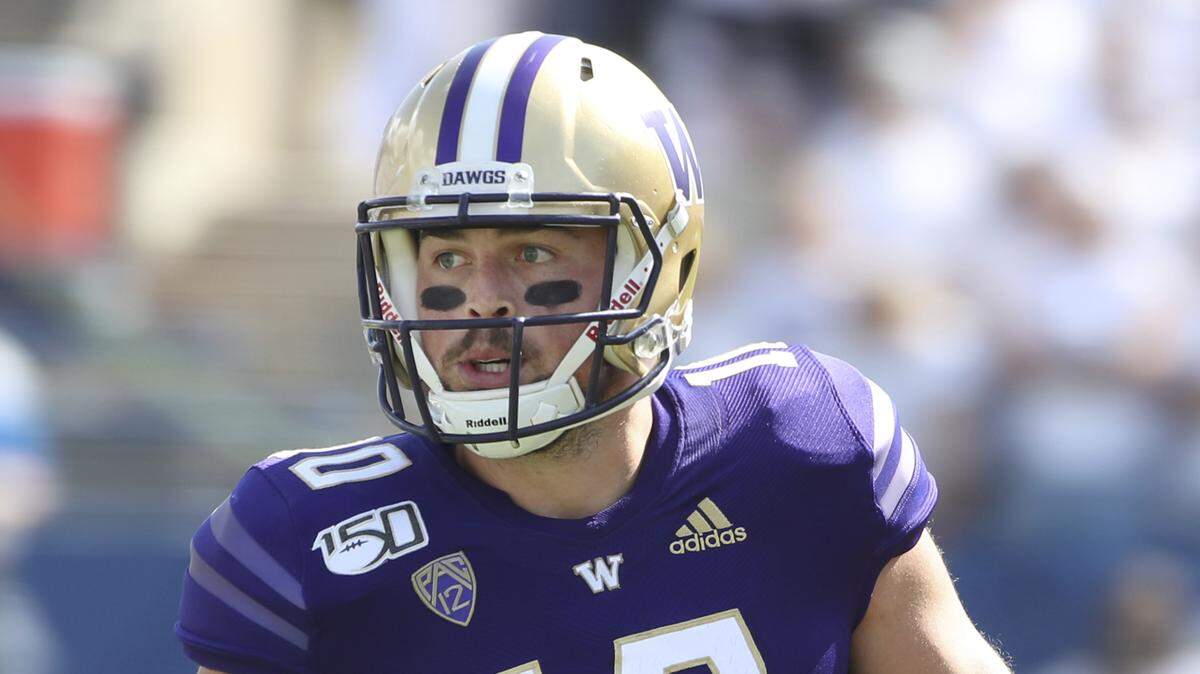 Washington quarterback Jacob Eason (10) looks to pass the ball during the first half of an NCAA college football game against BYU, Saturday, Sept. 21, 2019, in Provo, Utah. (AP Photo/George Frey)