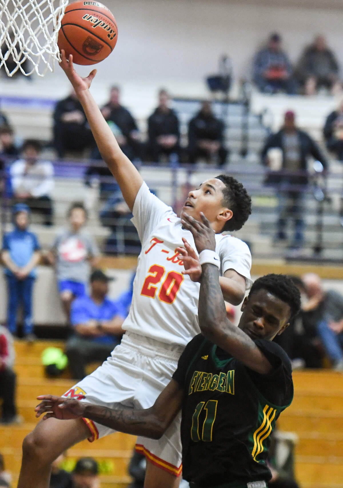 Mount Tahoma’s Asjon Anderson puts up a shot during the first quarter. Mount Tahoma played Evergreen in a basketball game at Puyallup High School in Puyallup, Wash., on Thursday, Feb. 20, 2020.