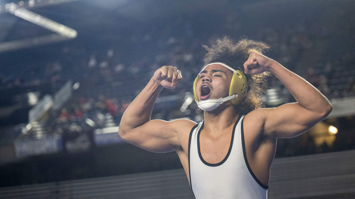 Lincoln’s Navarre Dixon celebrates after pinning Hermiston’s Jaxson Gribskov in the 182-pound, Class 3A championship match at Mat Classic XXXIV on Saturday, Feb. 18, 2023, at the Tacoma Dome in Tacoma, Wash. Dixon pinned Gribskov in 1 minute, 27 seconds.