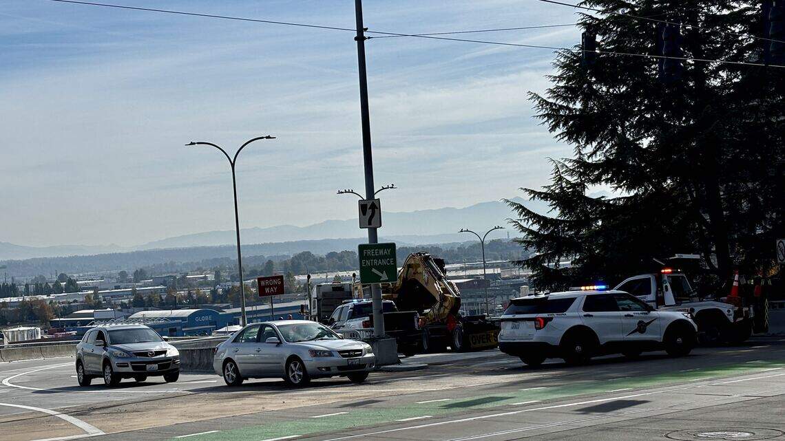 Stuck semi blocks Tacoma interchange. ‘He totally didn’t mean to go this way’