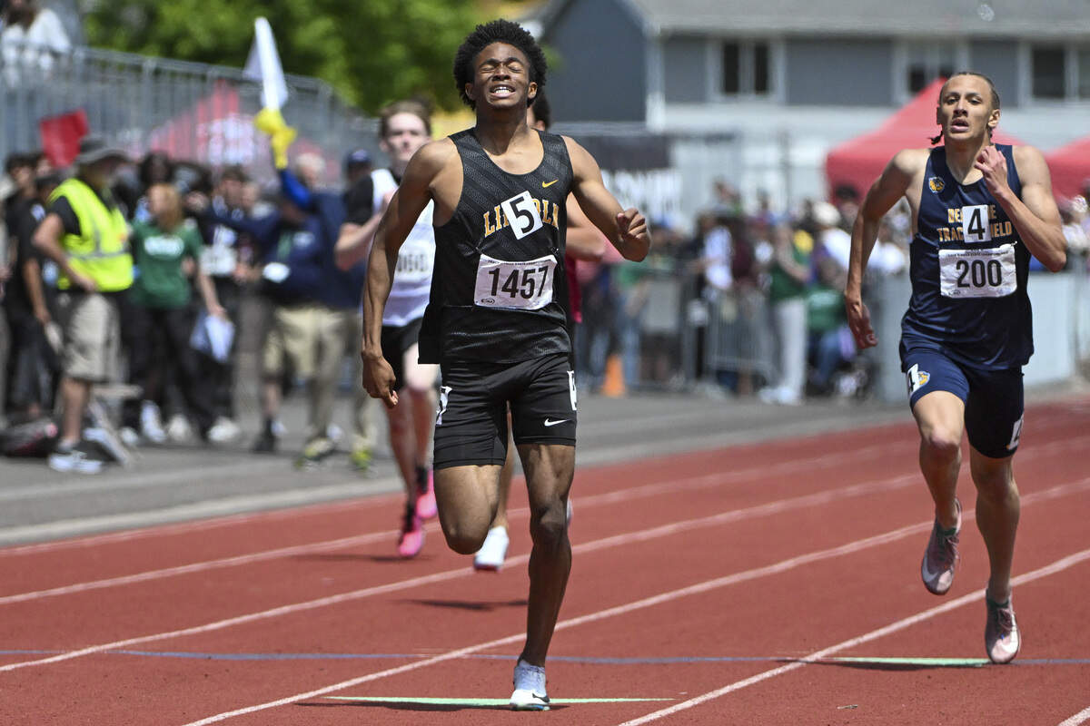 Lincoln’s Eddie Bruner Jr. holds the lead in the 3A Boys 400M Dash final on Saturday, May 30, 2026, at the 2026 State Track & Field Championships in Tacoma, Wash.