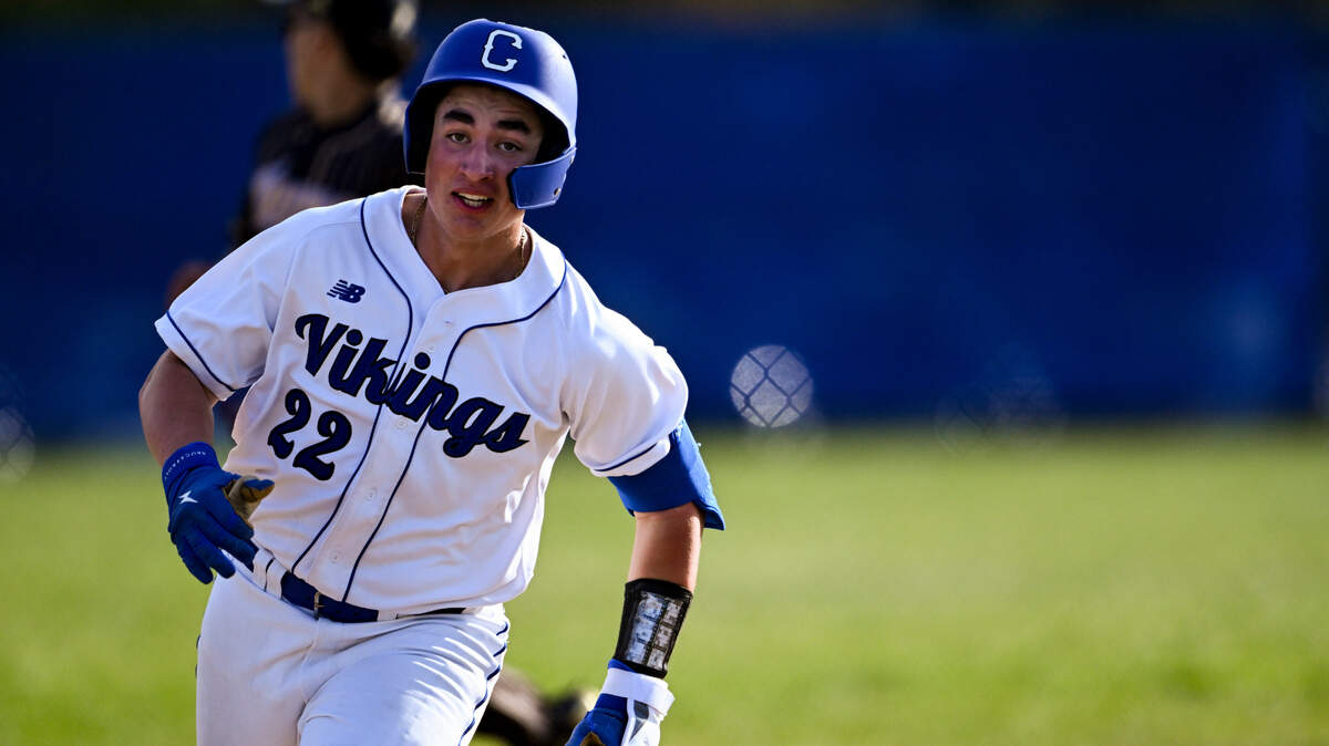 Curtis’s Harlan Carrillo (22) sprints for third base against Puyallup during the baseball game at Curtis Senior High School, on Tuesday, April 15, 2025, in University Place, Wash.