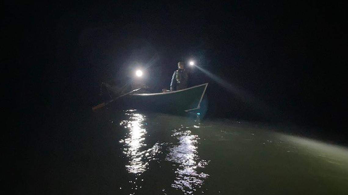 Jefferson County deputies and search and rescue members navigated an Oregon river with flashlights and headlamps to rescue two anglers who were stranded in freezing temperatures.
