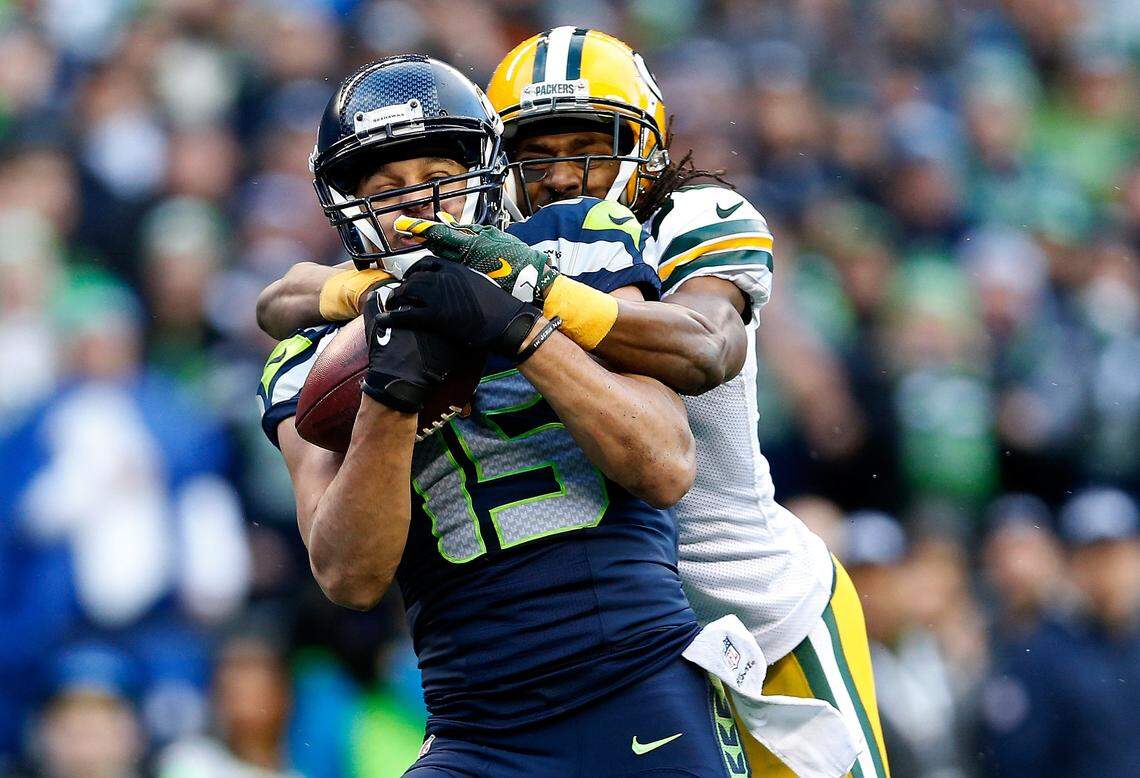 SEATTLE, WA - JANUARY 18: Jermaine Kearse #15 of the Seattle Seahawks catches a 35 yard game-winning touchdown in overtime against the Green Bay Packers during the 2015 NFC Championship game at CenturyLink Field on January 18, 2015 in Seattle, Washington. (Photo by Christian Petersen/Getty Images)