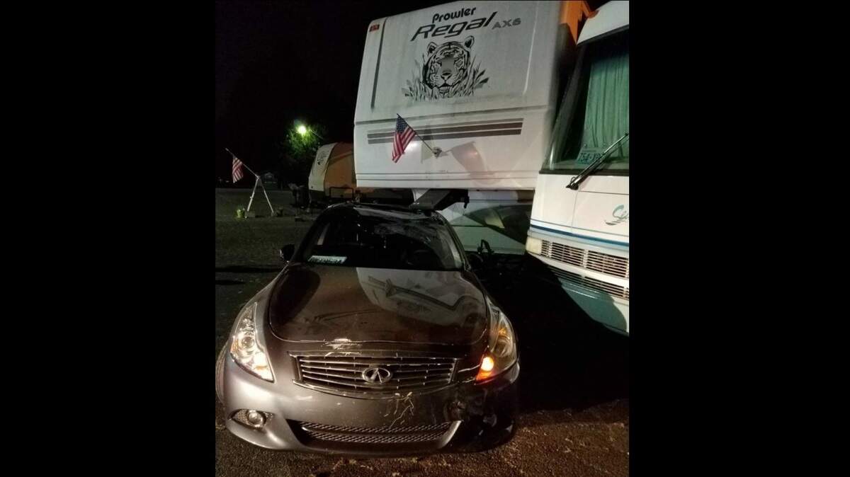 A drunken driver got his car wedged beneath the hitch of a fifth-wheel trailer Saturday night in Puyallup, police said. He tried to pull away, dragging the trailer for a short distance and into the side of an RV.
