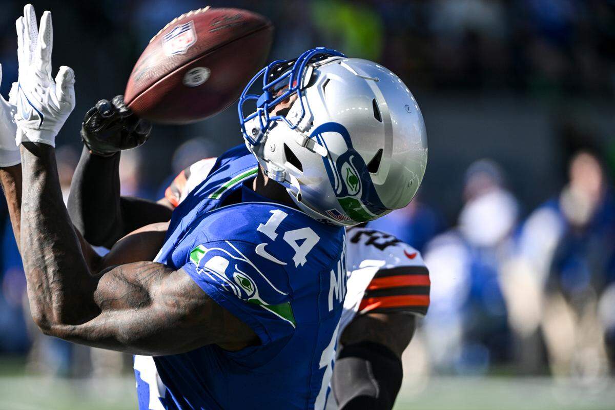 Seattle Seahawks wide receiver DK Metcalf (14) catches a pass against Cleveland Browns cornerback Martin Emerson Jr. (23) during the first quarter of the game at Lumen Field, Sunday, Oct. 29, 2023, in Seattle, Wash.